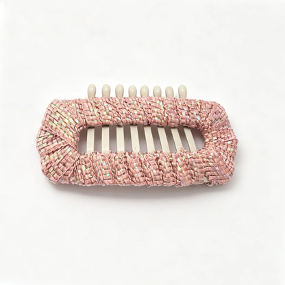 Petal Rose Aurora Weave Shimmer dog barrette, a soft pink woven hair clip for small long-haired dog styling.