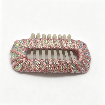 Petal Rose Iridescent Sheen dog barrette, a soft pink reflective hair clip for Shih Tzu face-framing styling.
