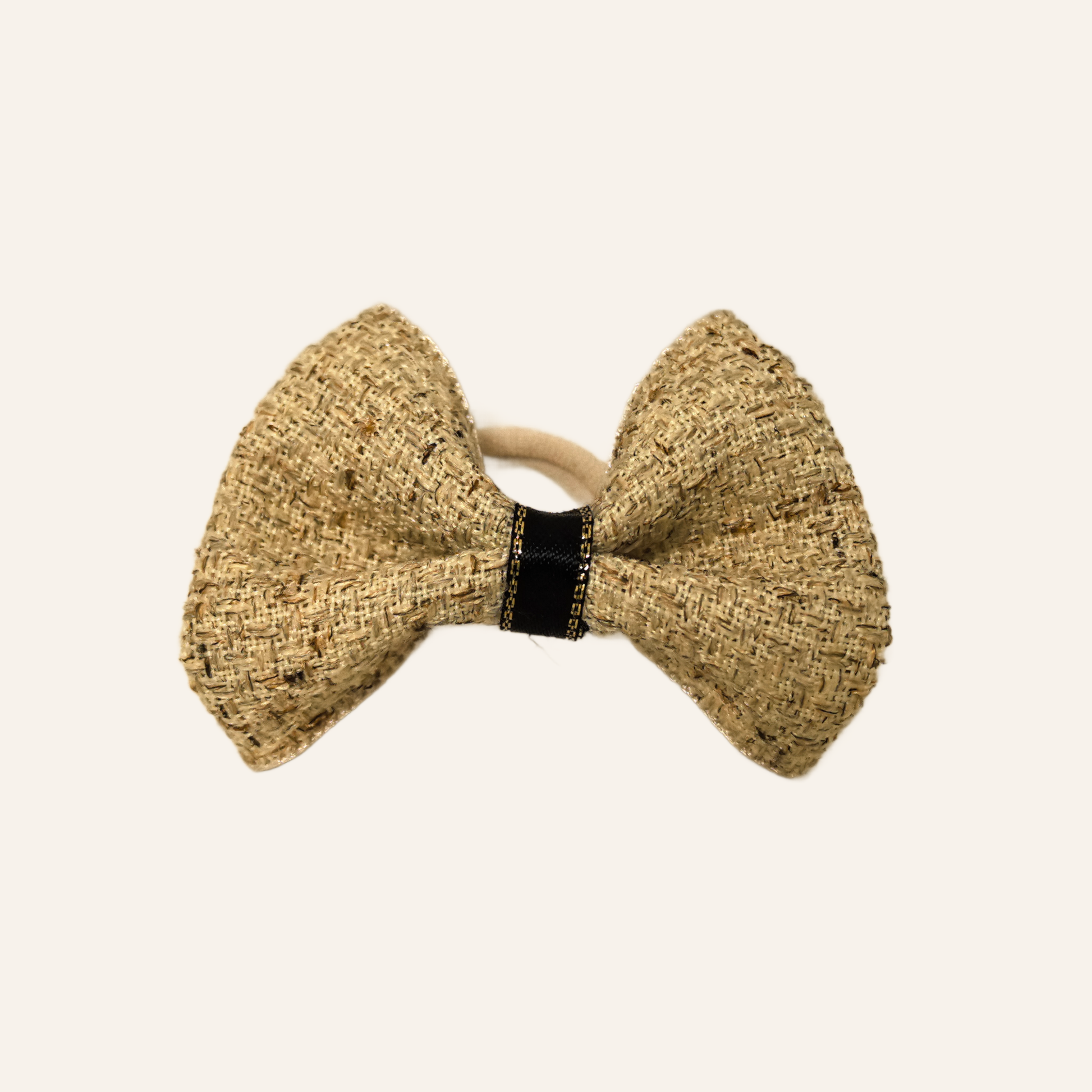 SilkyCo Detachable Tweed Pet Bow in Apricot- Front view on a neutral background.