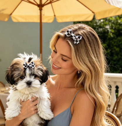  Celebrate the bond with your fur baby with SilkyCo’s "Mommy & Me" matching checkerboard bow set. This black and white duo features our signature handcrafted bows for both you and your Shih Tzu. Perfect for sunny outdoor brunches and creating share-worthy memories on social media. Durable, soft, and designed for matching perfection.
