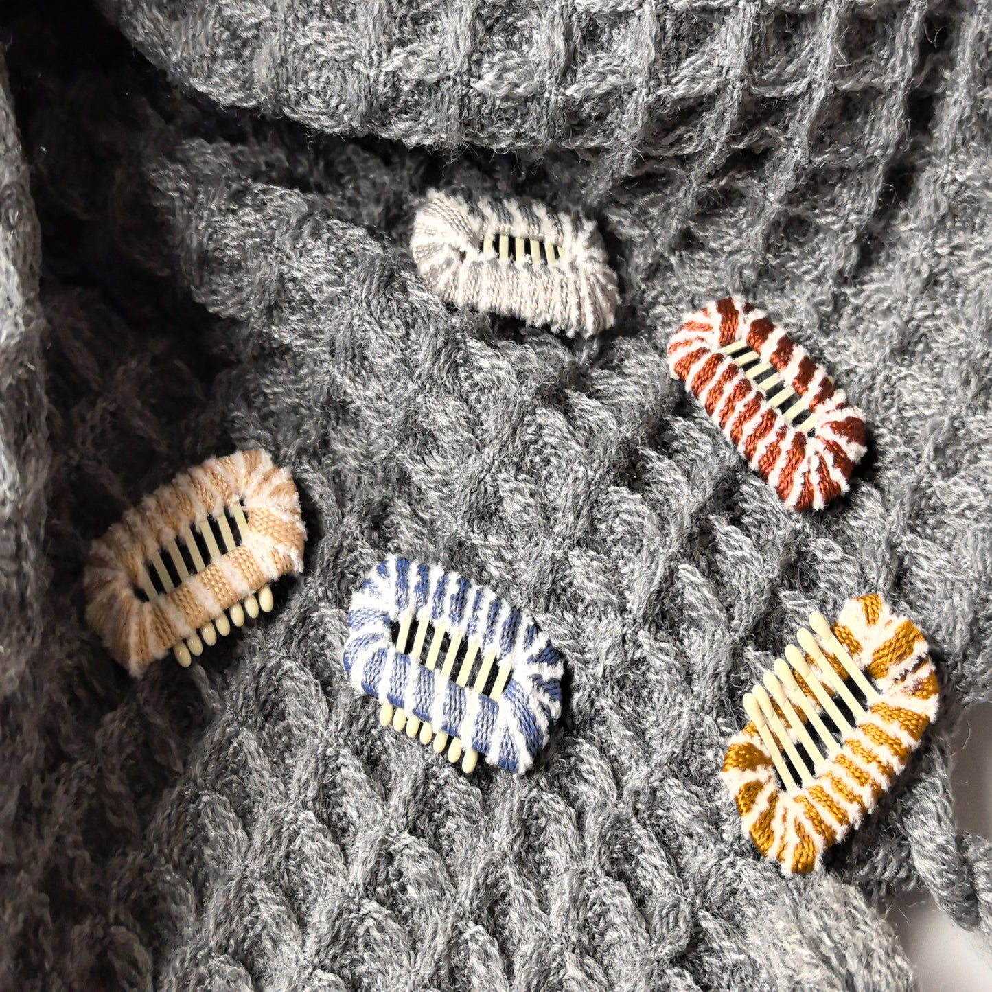 Small dog hair clips in Reddish Brown,  Light Brown, Nude, Smoky Blue, and gray stripes - grooming accessories