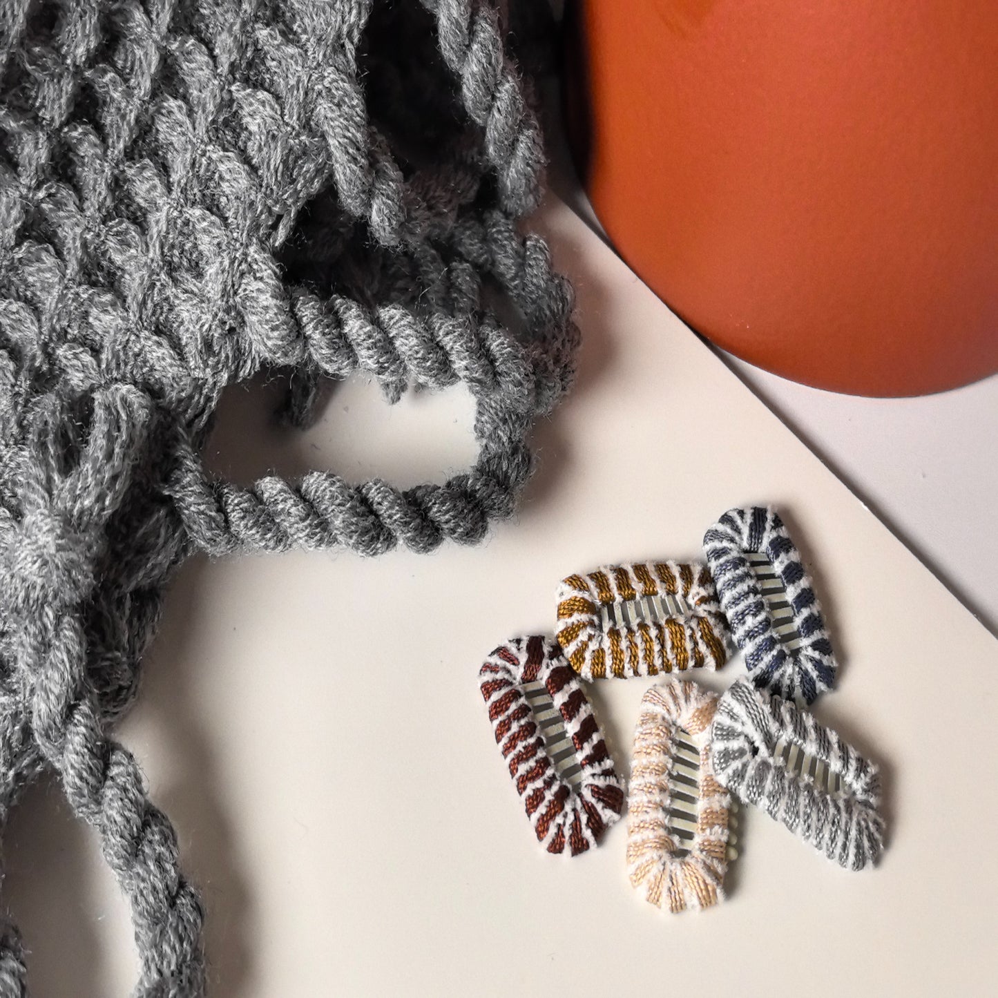 Soft braided dog hair clips and barrettes for small breeds in neutral colors