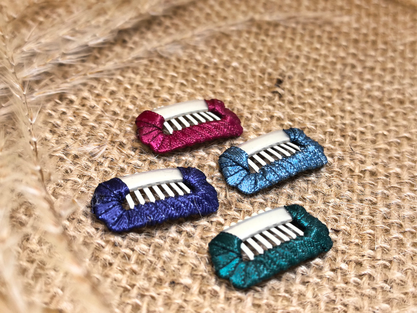 Velvet Hour dog barrettes in Bordeaux, Peacock Blue, Prussian Blue and Turquoise Mist for Shih Tzu, Maltese, and Yorkie styling.